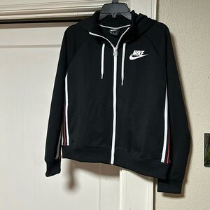 Women’s Nike zip up hooded jacket with red and white stripes sized medium.